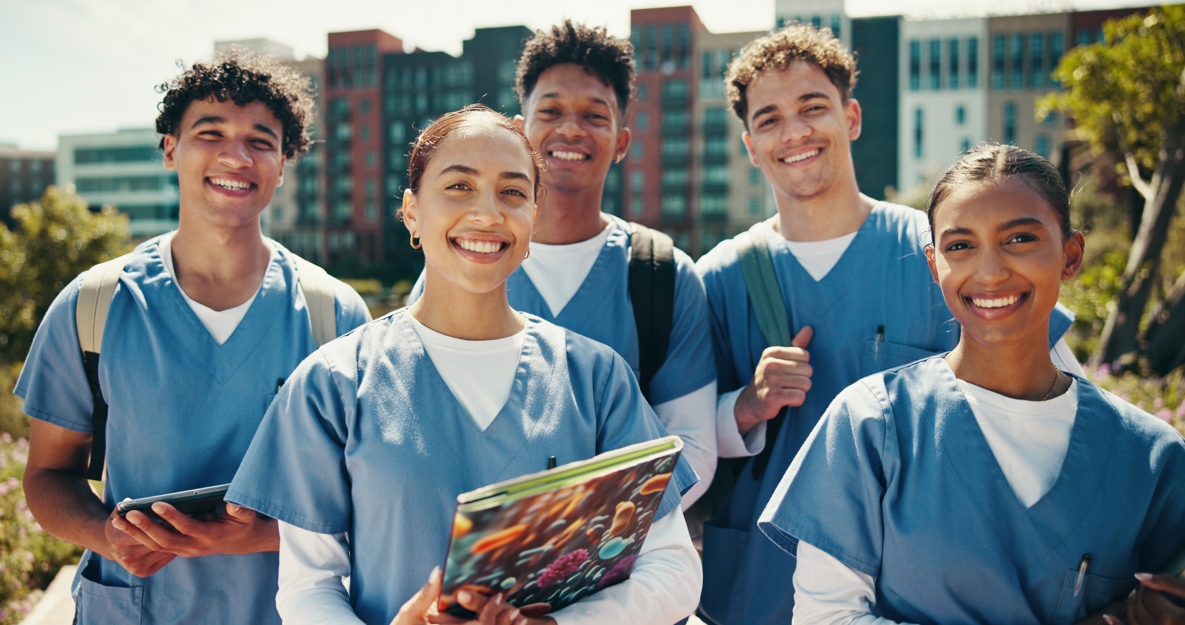 nursing students smiling at the camera