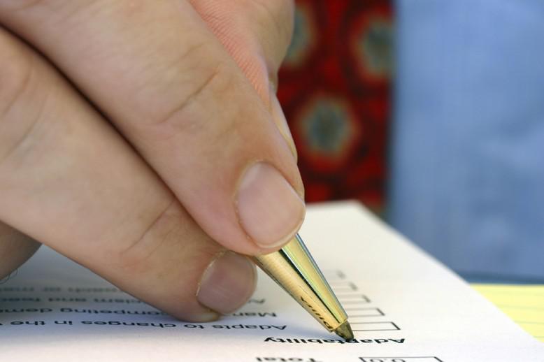 Students writes with pen 