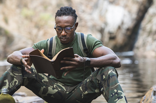 soldier reading about the ethics of war