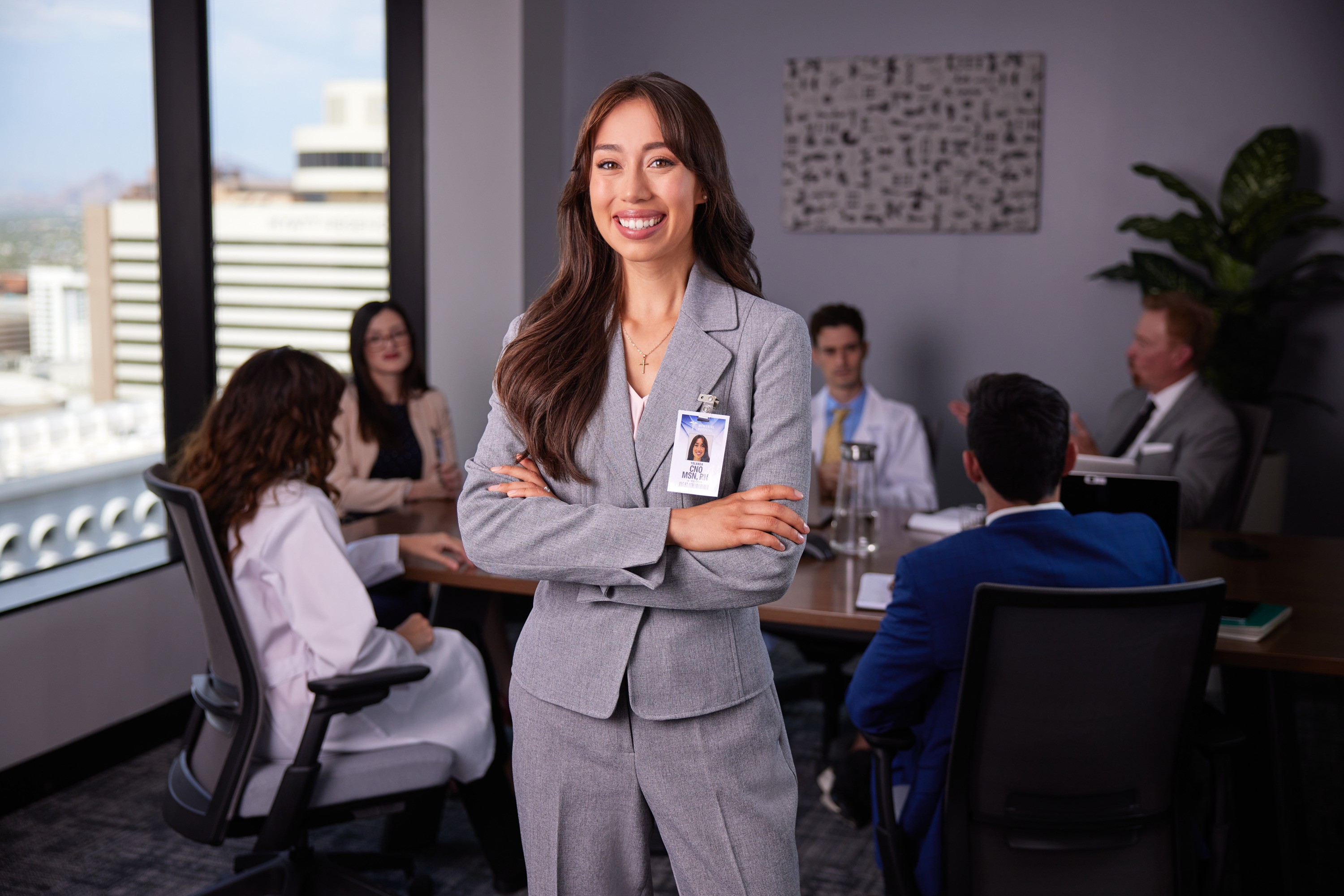 Portrait of GCU enrollment counselor meeting with doctors and accrediting bodies