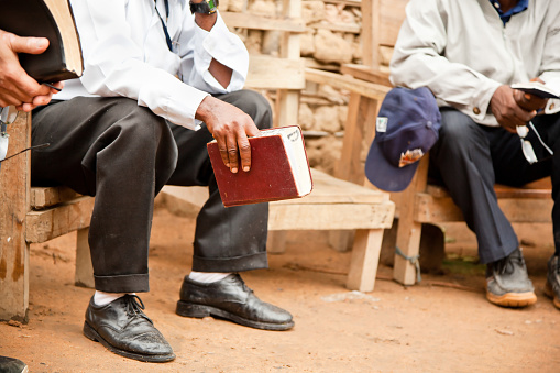 Missionaries sharing the word of God with each other